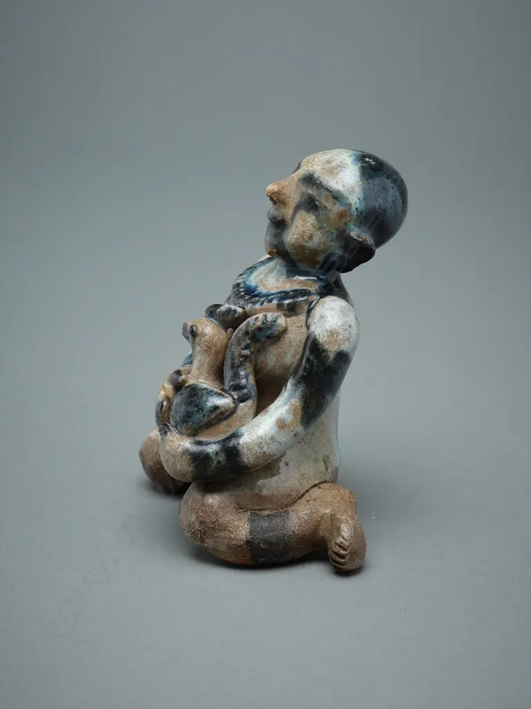 A Sawankhalok stoneware figure (tukatha), Image 1++